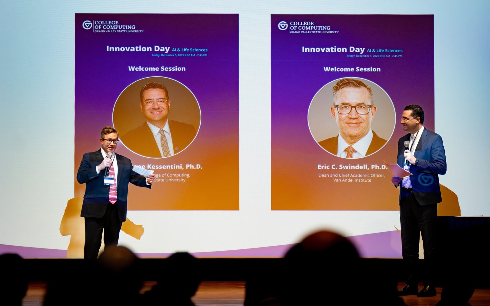 Dean Marouane Kessentini and VAI's Eric Swindell welcoming attendees to Innovation Day